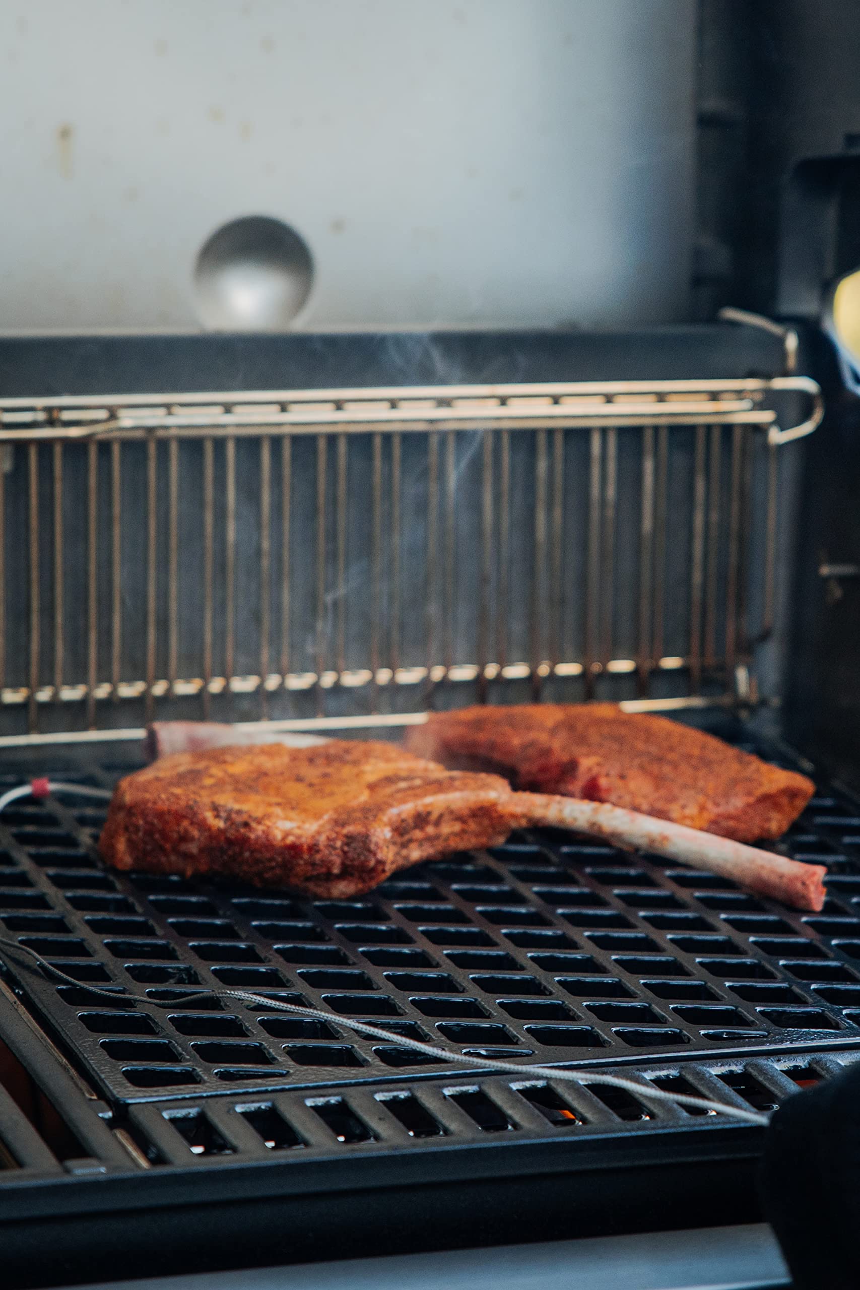 Lifestyle image of Weber Crafted frame in a backyard setup showing expanded cooking possibilities