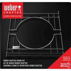 Weber Crafted frame stored under right-side grate illustrating compact storage benefit