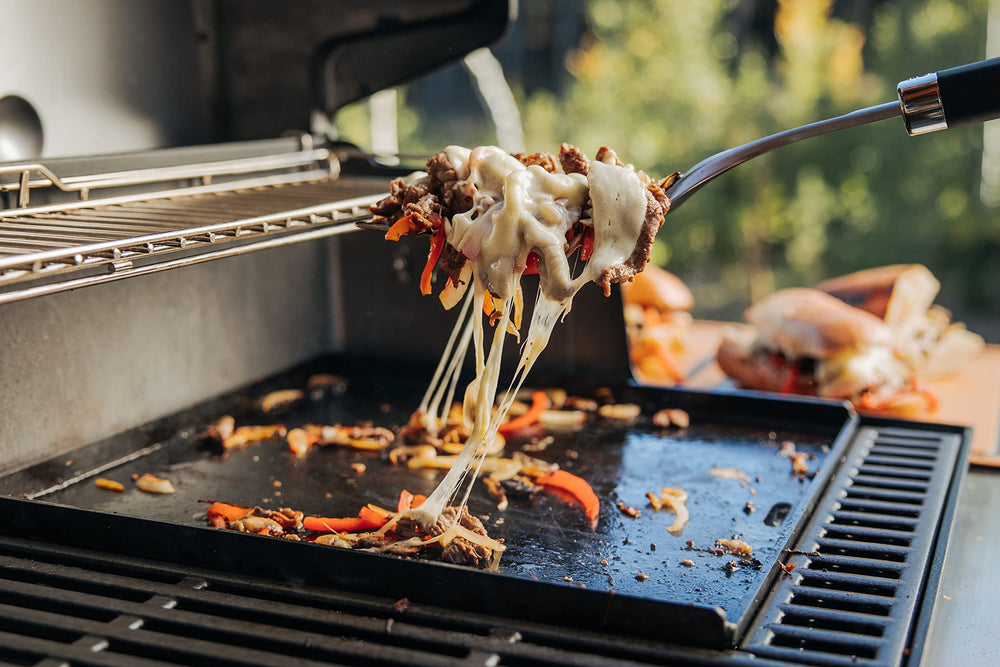 Weber Crafted griddle next to common items for scale and capacity benefit