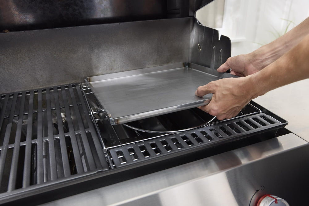 Weber Crafted griddle with smash burgers demonstrating even browning benefit