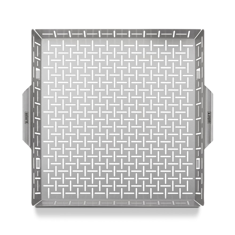 Weber closeup of perforations highlights even heat circulation and precise browning benefit