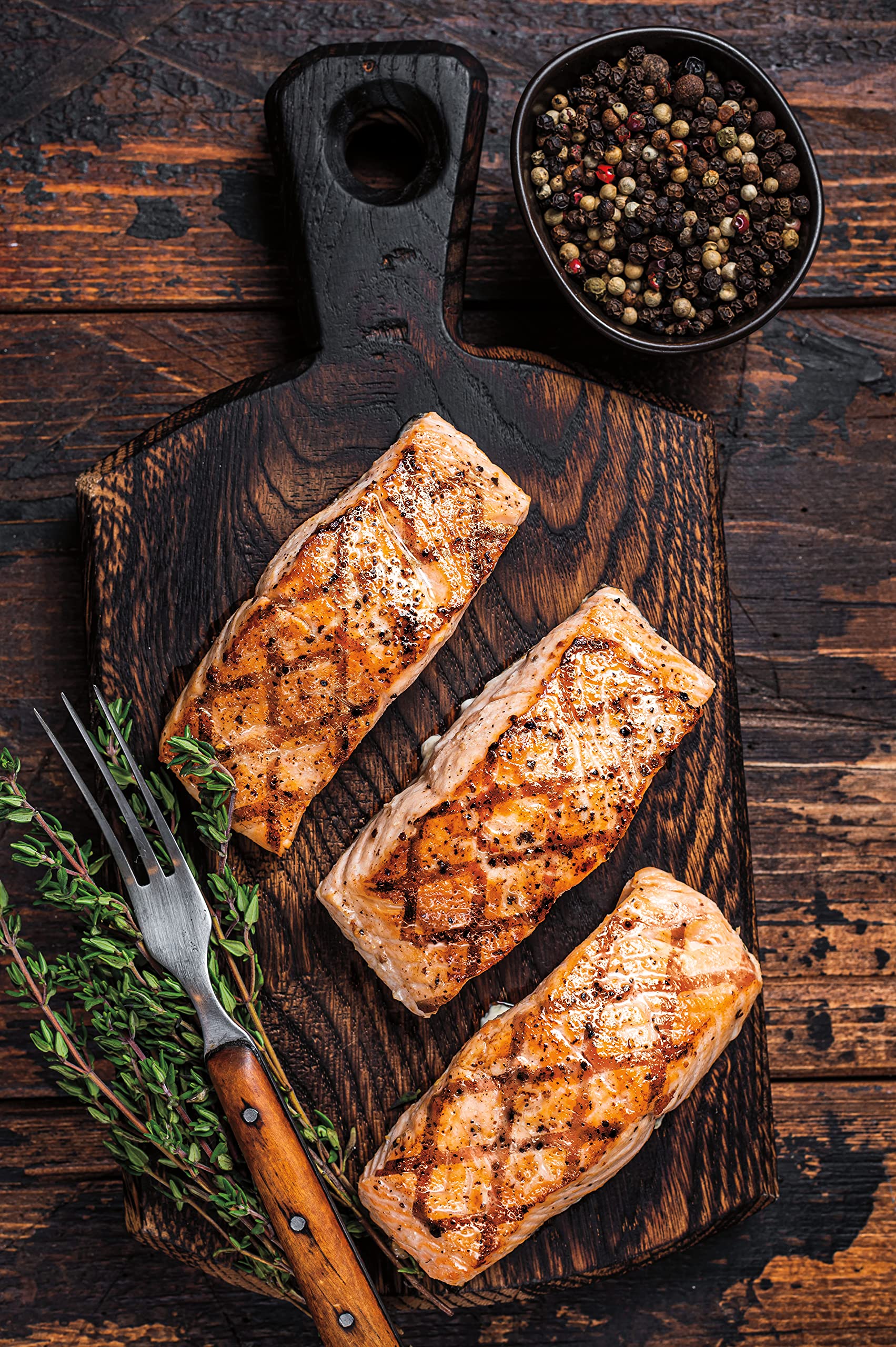 Weber porcelain‑enamel finish close detail preventing sticking and easing flips
