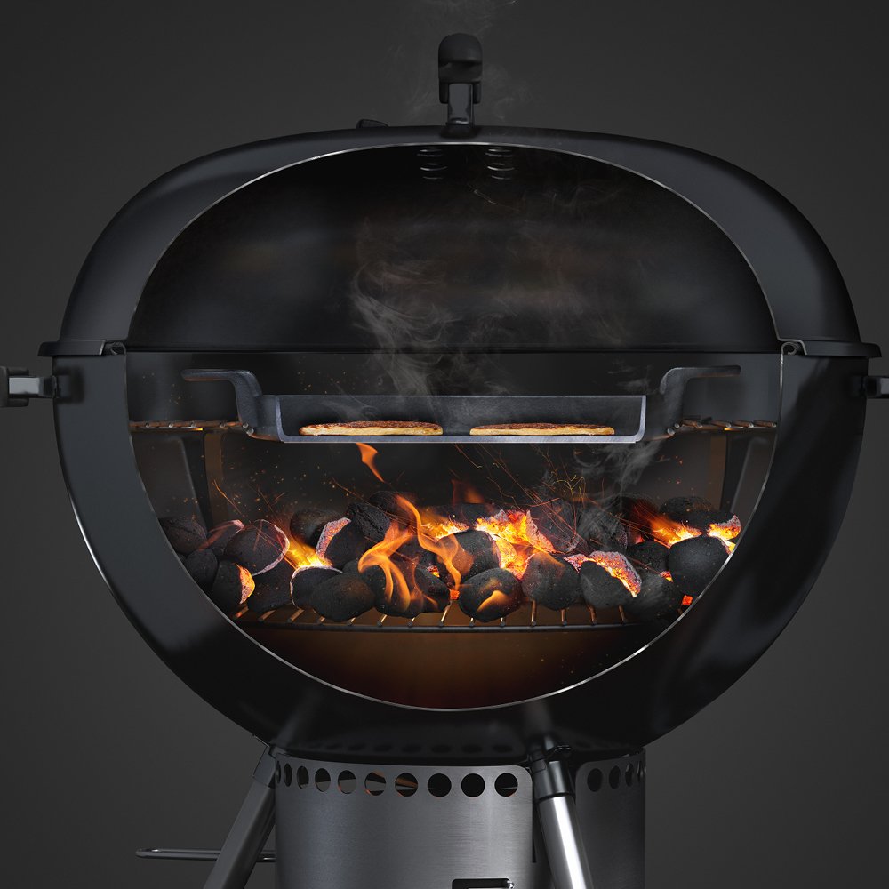 Weber griddle installed in a charcoal grill demonstrating secure fit and versatility