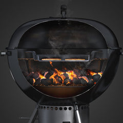 Weber griddle installed in a charcoal grill demonstrating secure fit and versatility
