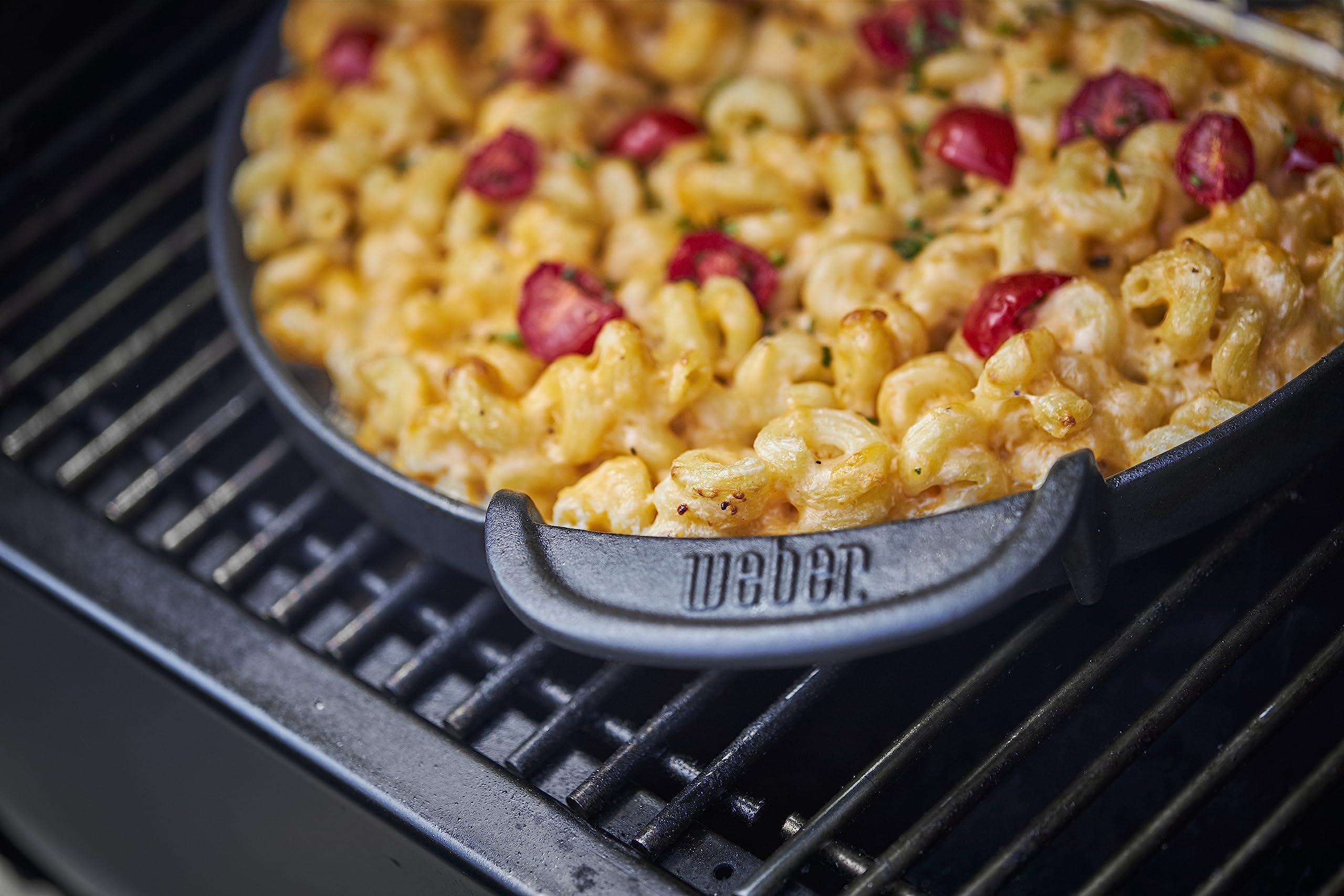 Weber griddle cooking pancakes and eggs to show nonstick cooking and easy flipping