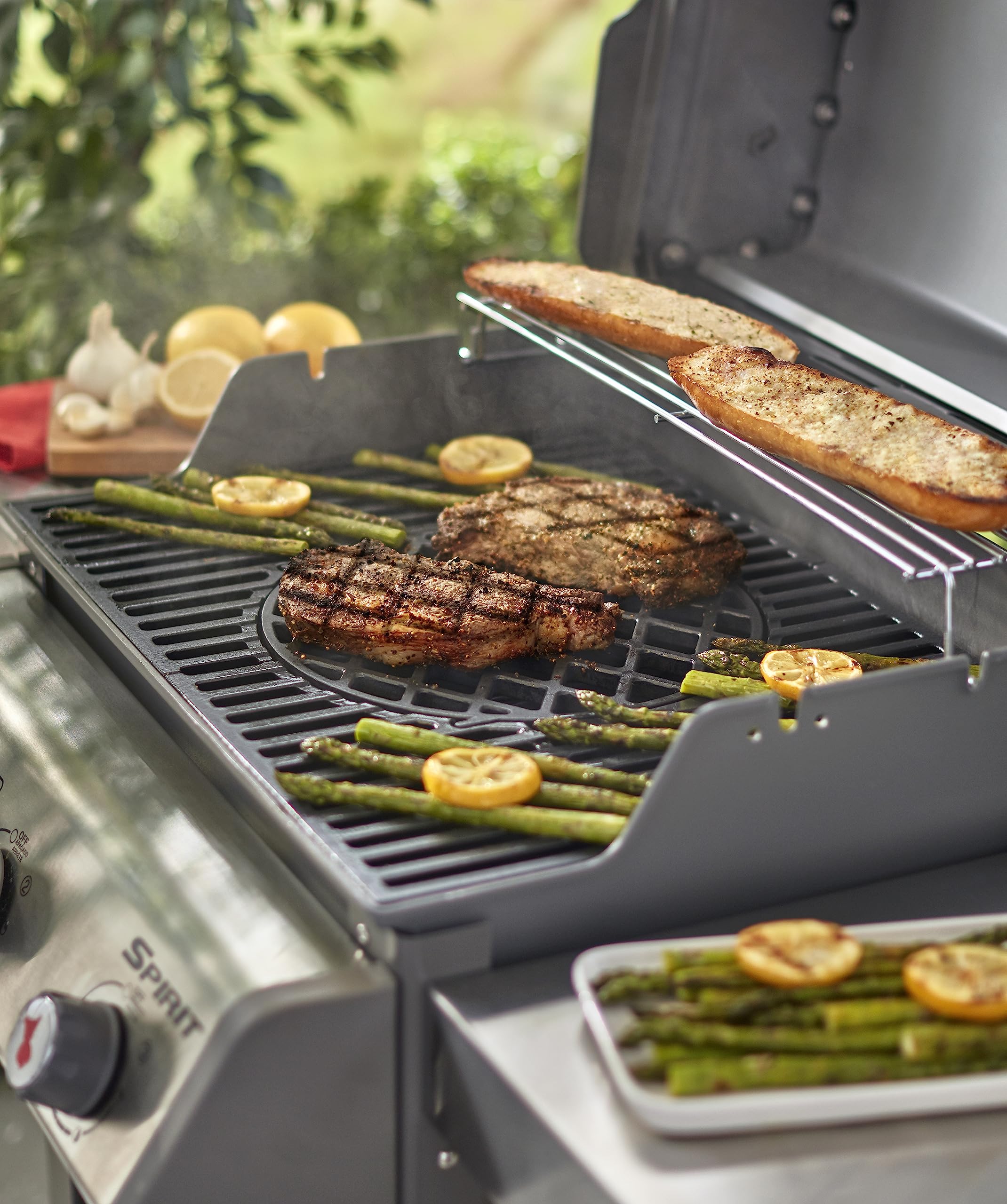 Lifestyle scene of Weber sear grate in backyard grill setup enabling restaurant-style sears