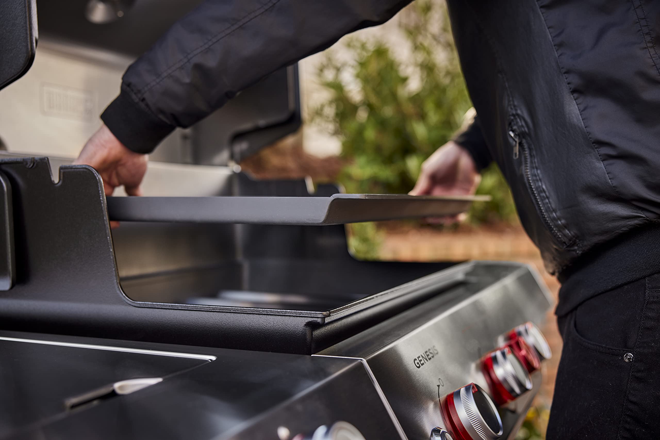 Weber griddle close texture highlighting pre seasoned carbon steel and durability