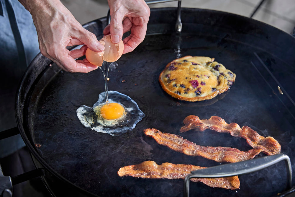 Weber griddle close-up of pre-seasoned surface highlighting easy-release benefit