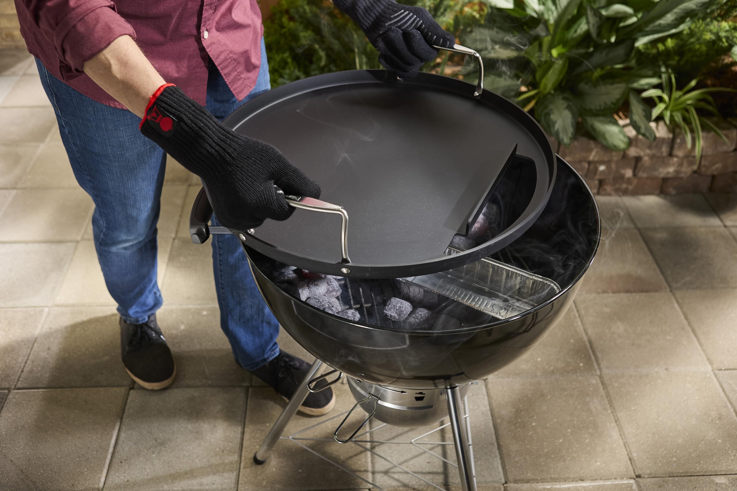 Weber griddle cooking pancakes outdoors showing large-capacity batch cooking benefit