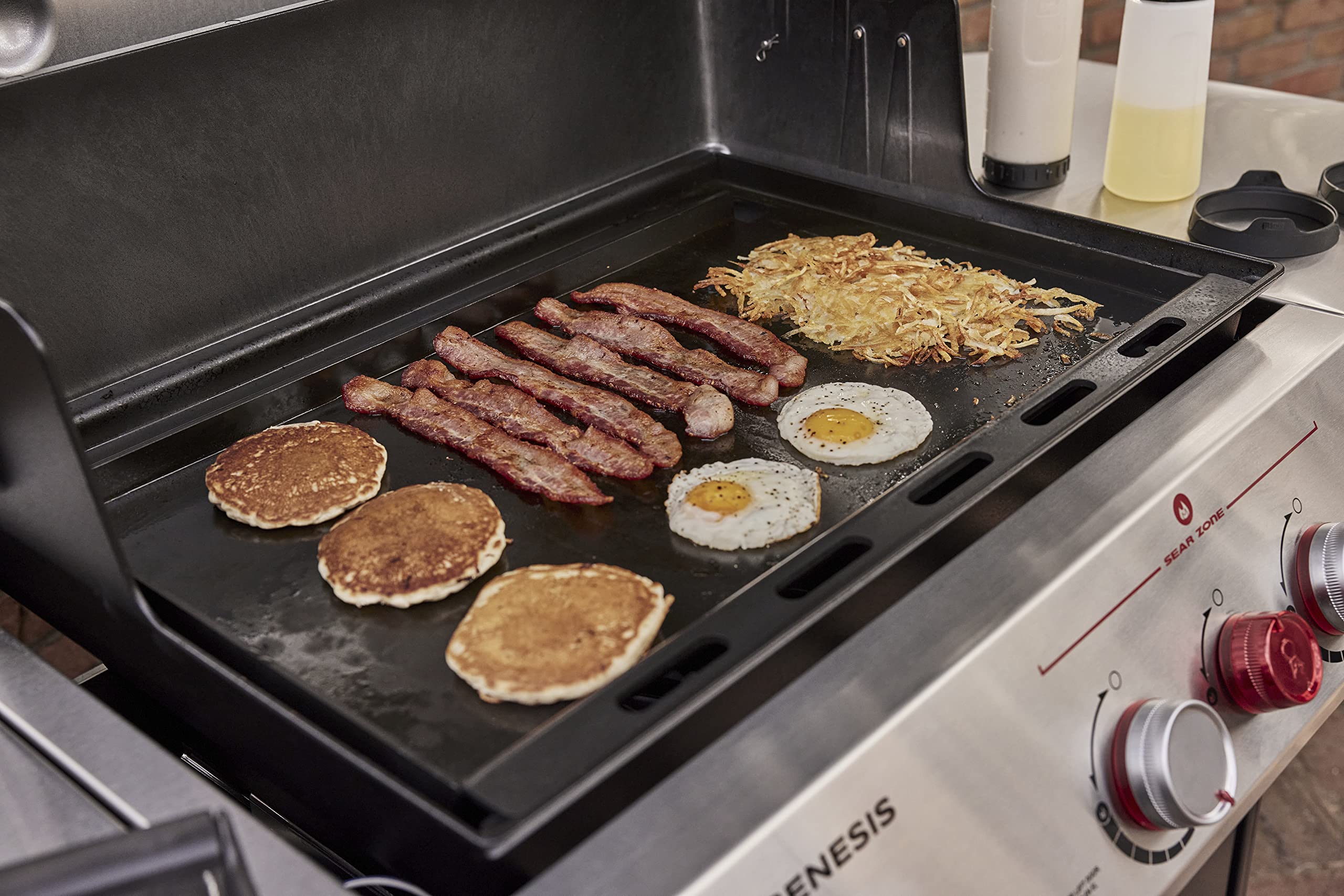 Weber griddle grease management detail showing rim and grease channel benefit