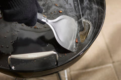 Weber griddle handles and rear grease slot detail for safe removal and clean cooking