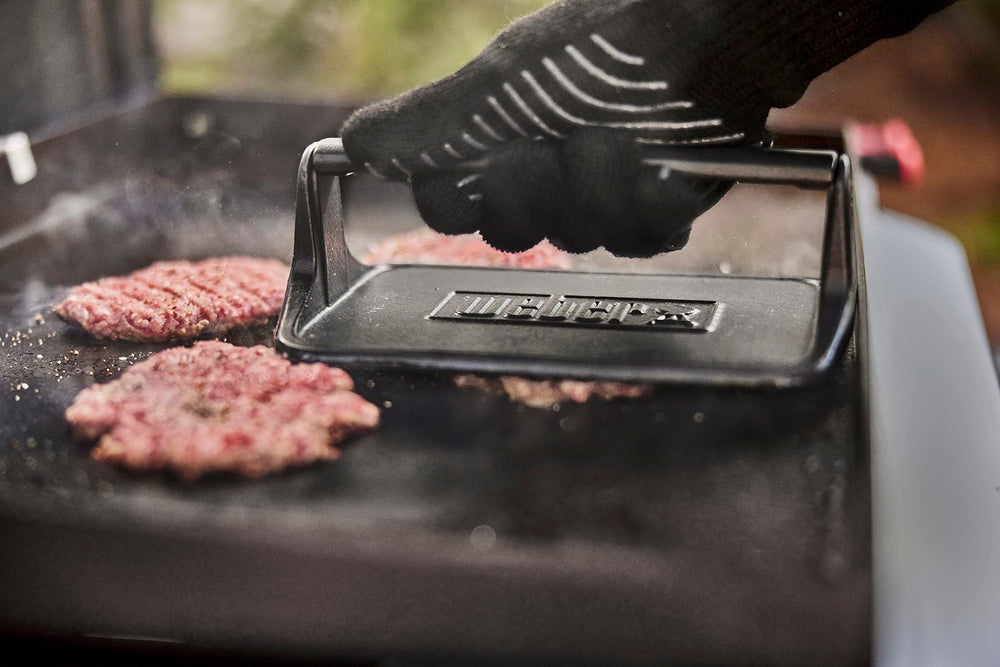 Weber handle detail for comfortable grip and controlled pressing during use