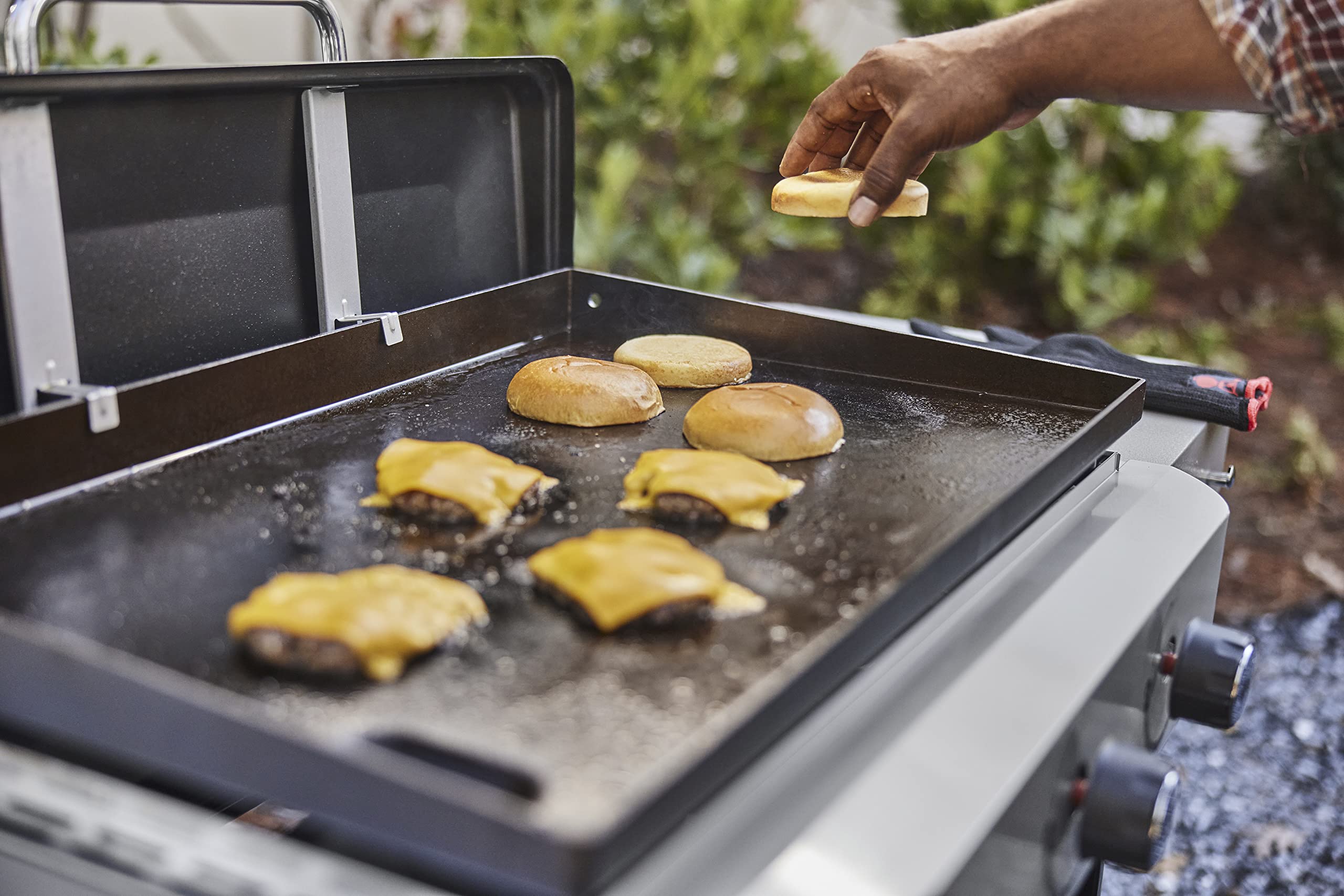 Weber boxed product with warranty label showing 2-year coverage and included details
