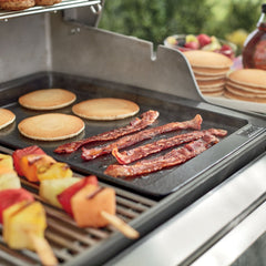 Weber griddle ridged side detail showing grill marks and grease channel for cleaner cooks