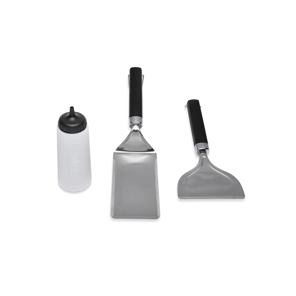 Weber griddle set front packaging showing all three tools and benefits