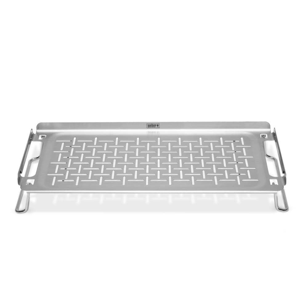 Weber warming rack collapsed for compact storage, saving space and simplifying transport