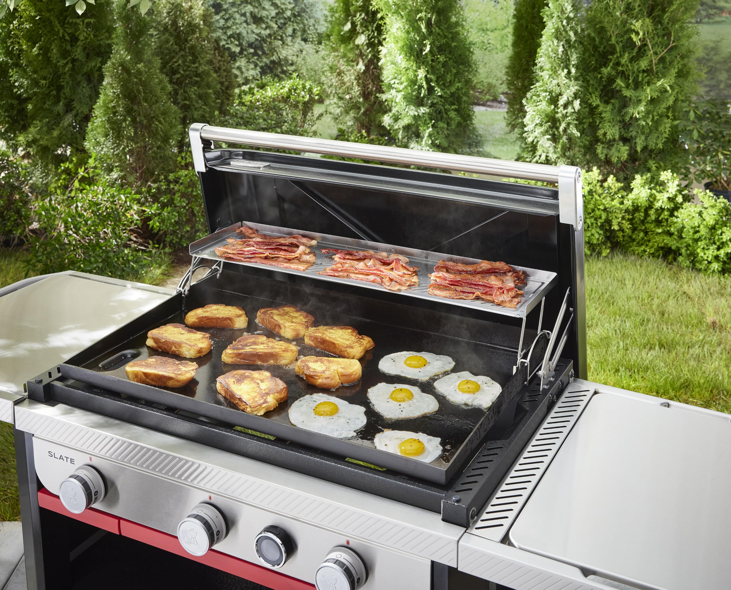 Weber warming rack toasting buns while griddle cooks below for faster service