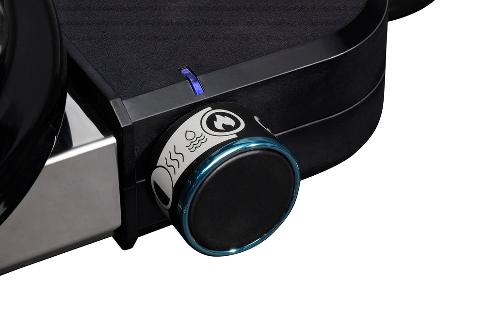 Weber Lumin front-access grease tray open showing quick cleanup benefit