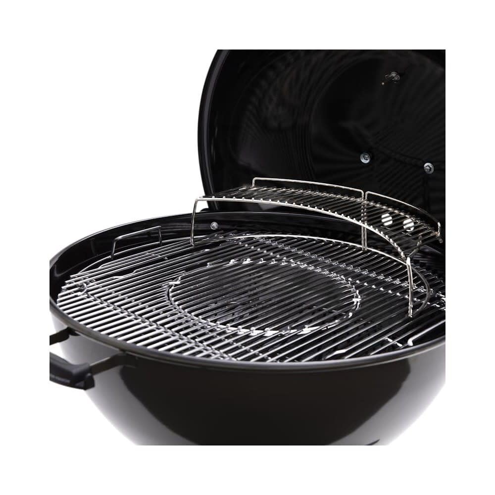 Weber Master-Touch ash catcher access showing easy cleanup and ash removal benefit