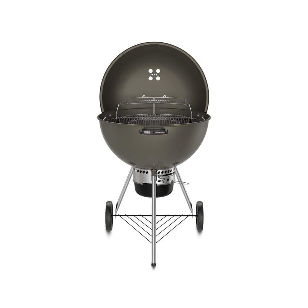 Weber Master-Touch with center grate removed demonstrating accessory-ready versatility