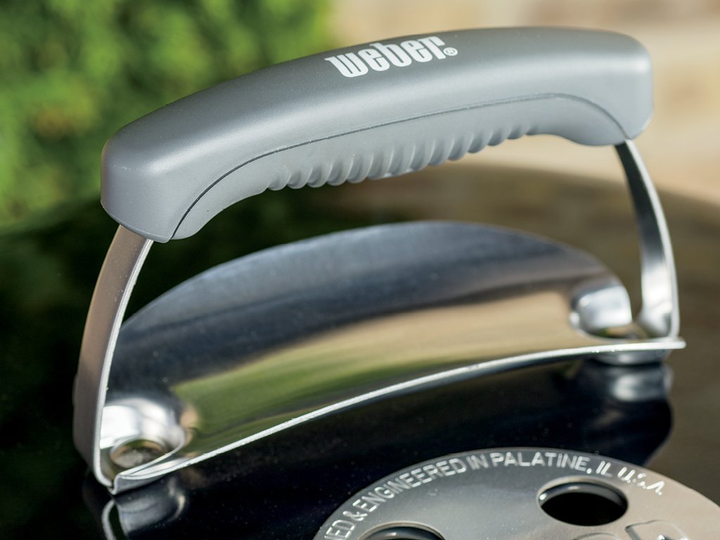 Weber kettle cooking surface with burgers to illustrate capacity and portion scale