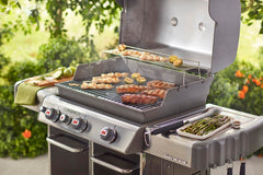 Weber grates installed in Genesis 300 grill demonstrating restored cooking performance