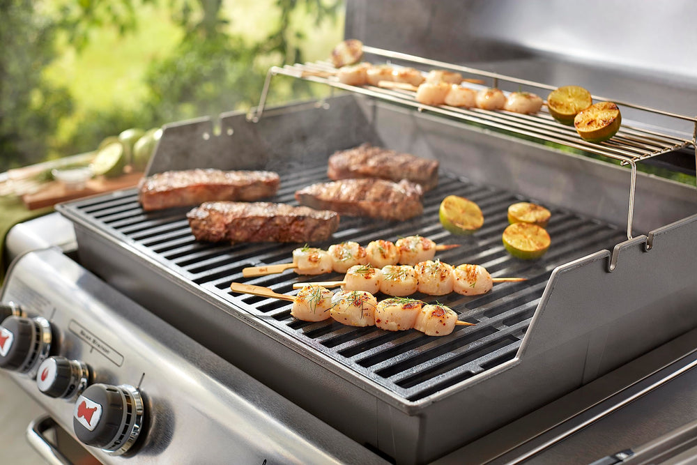 Weber grates in a backyard grill scene illustrating professional sear and outdoor enjoyment