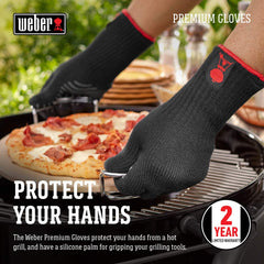 Weber gloves in use holding tongs showing improved control at the grill