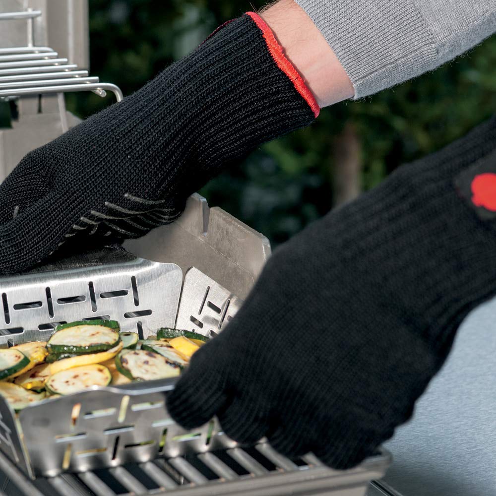 Weber gloves worn in backyard grilling scene showing practical everyday use