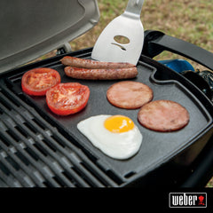 Weber Q close-up of porcelain-enameled finish highlighting easy-clean benefit
