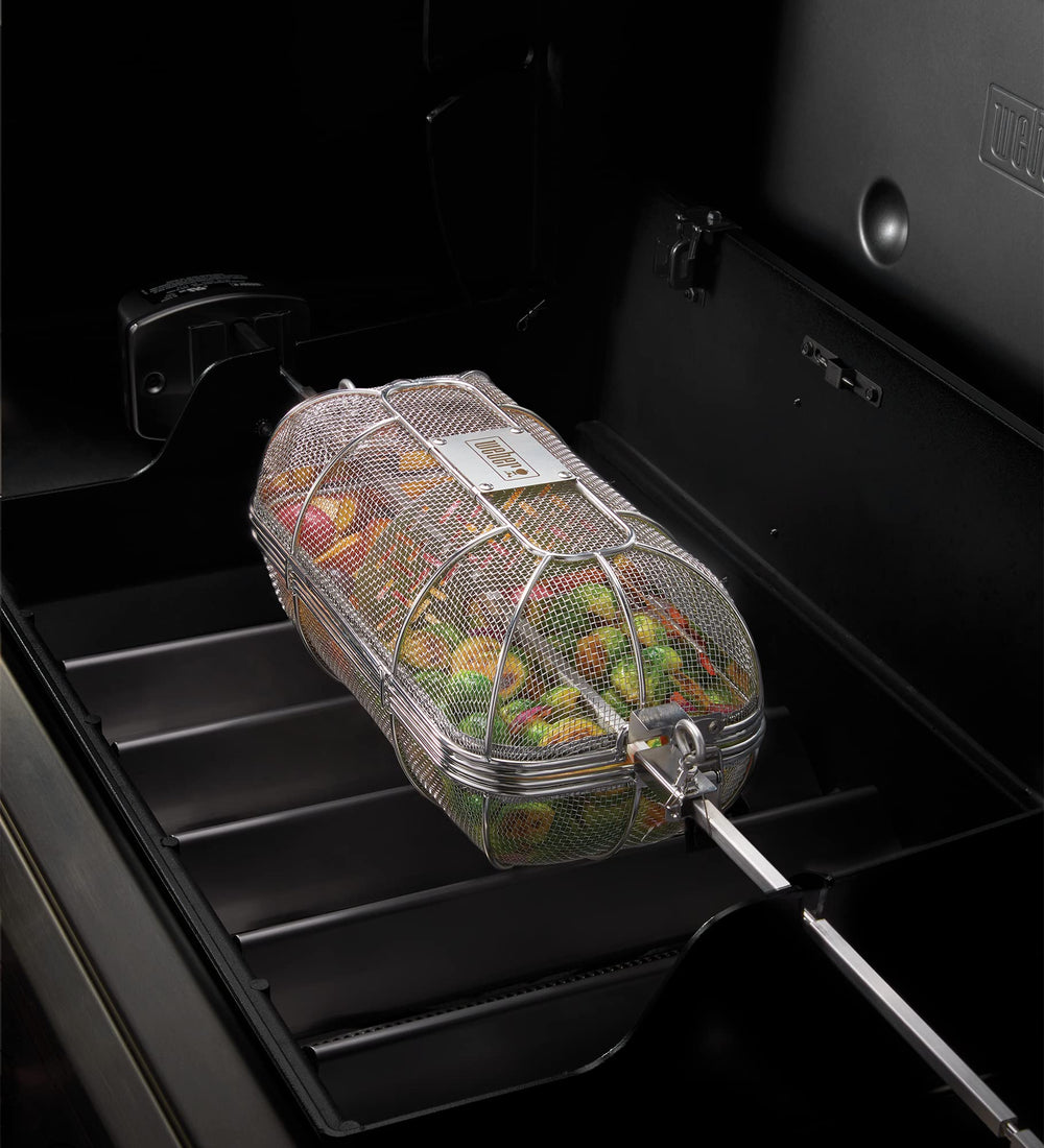 Weber basket full of crispy fries showcasing uniform browning and appealing texture