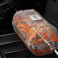 Weber basket with removable divider installed showing dual-compartment cooking advantage