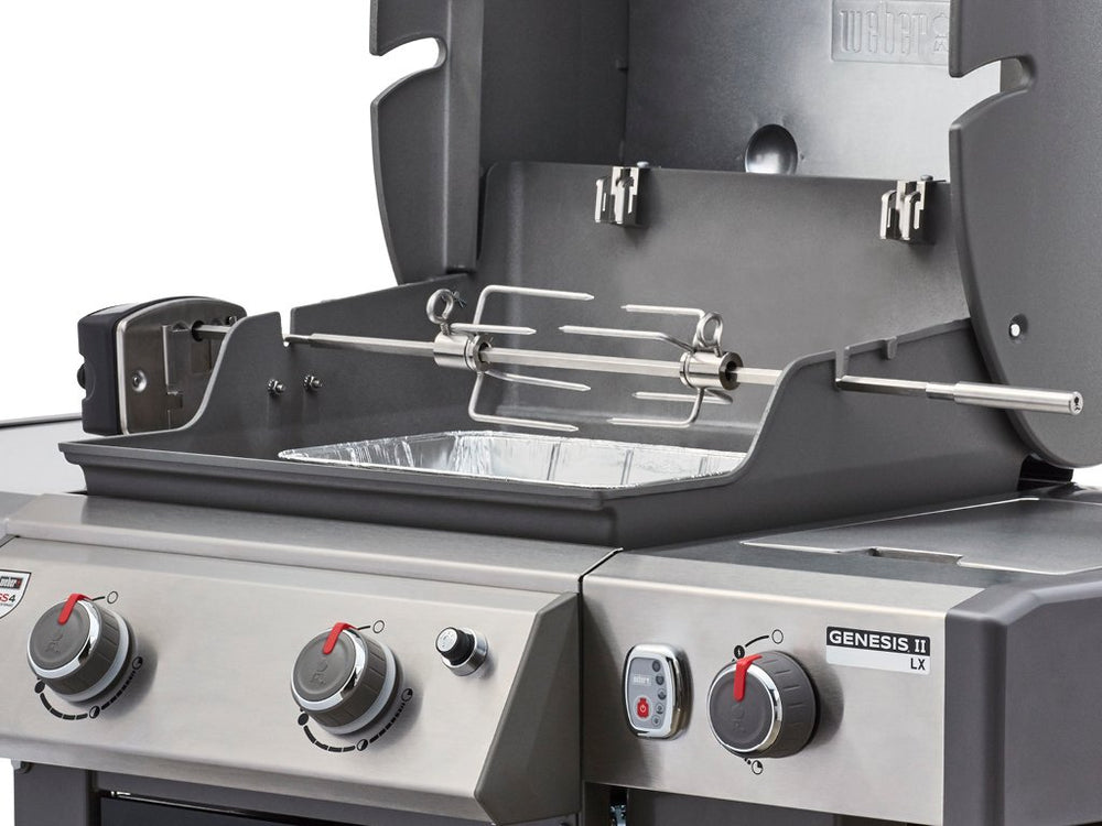 Weber rotisserie installed in Genesis grill showing proper fit and hands-off roasting
