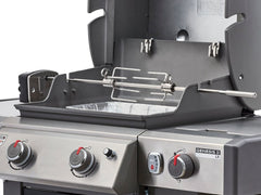 Weber rotisserie installed in Genesis grill showing proper fit and hands-off roasting