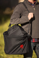 Weber tool pocket detail showing utensil storage convenience benefit