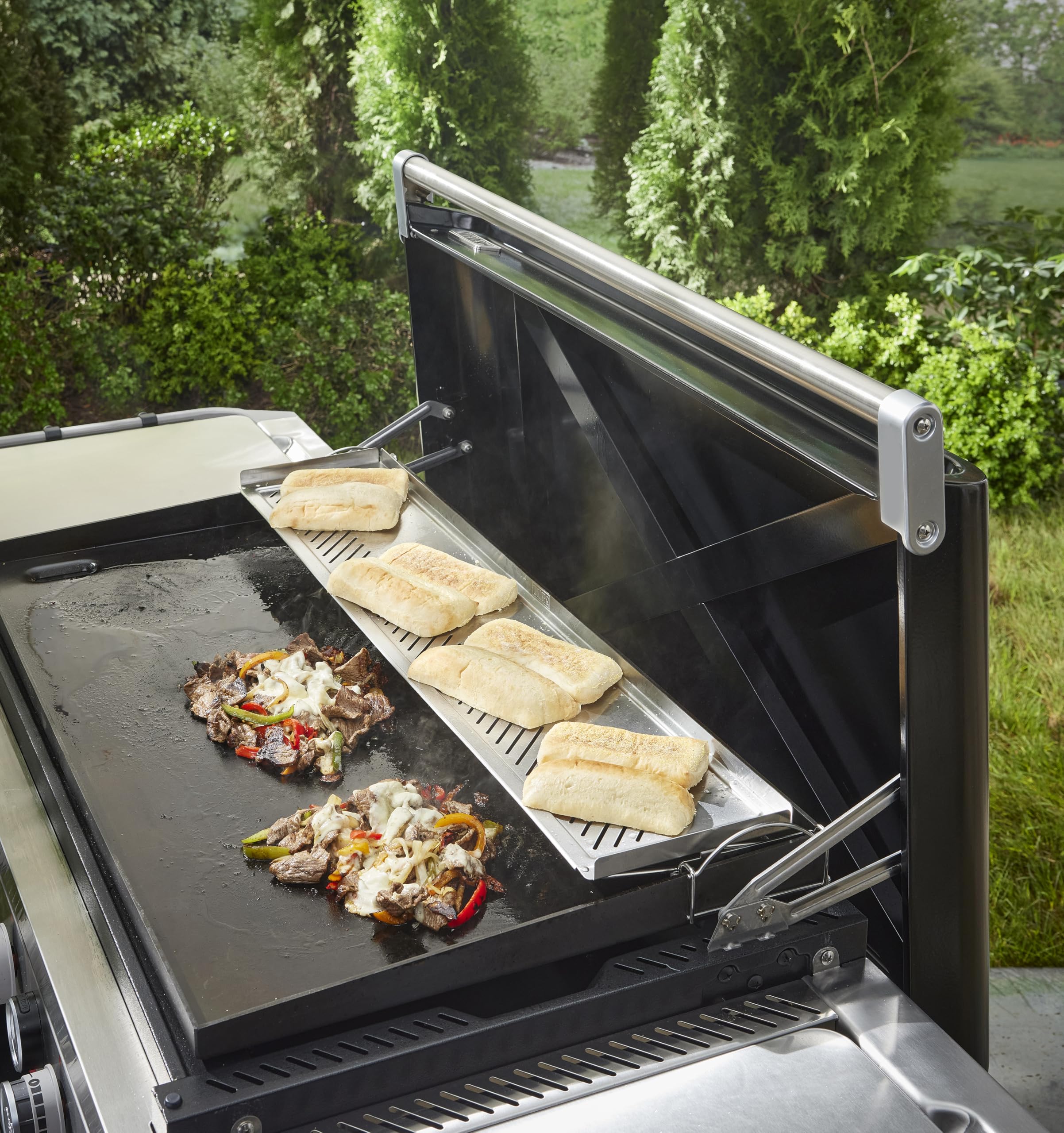 Weber warming rack installed on 36 inch Slate griddle to show size and added surface