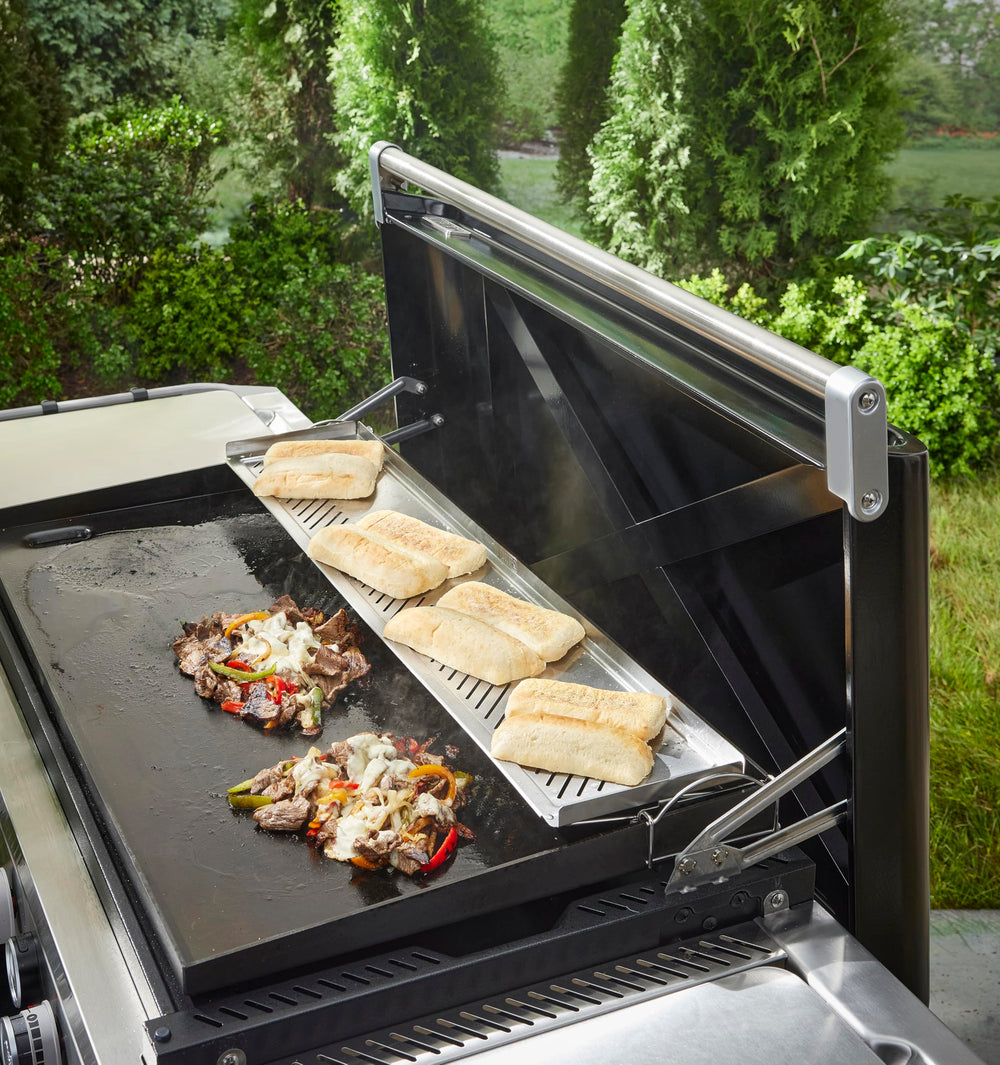 Weber warming rack installed on 36 inch Slate griddle to show size and added surface