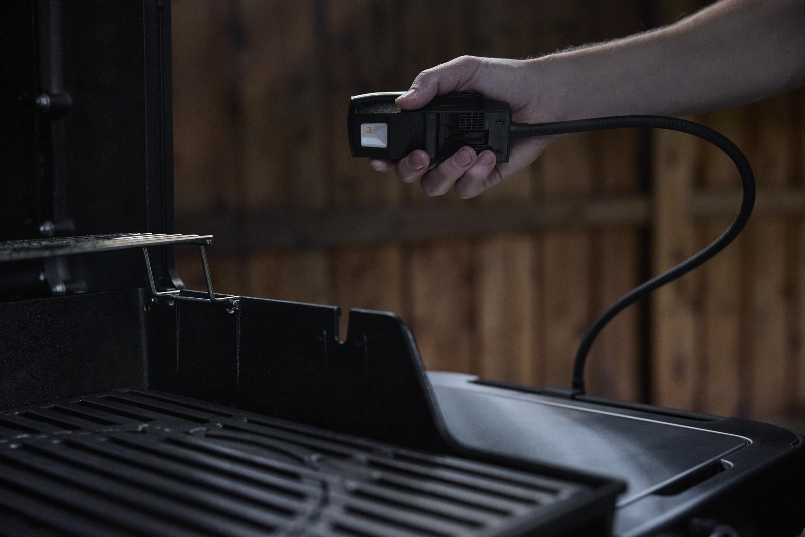 Weber Flex Light detached as flashlight for versatile backyard use