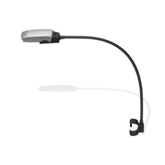Weber Works Flex Light mounted on grill showing bright cooking illumination