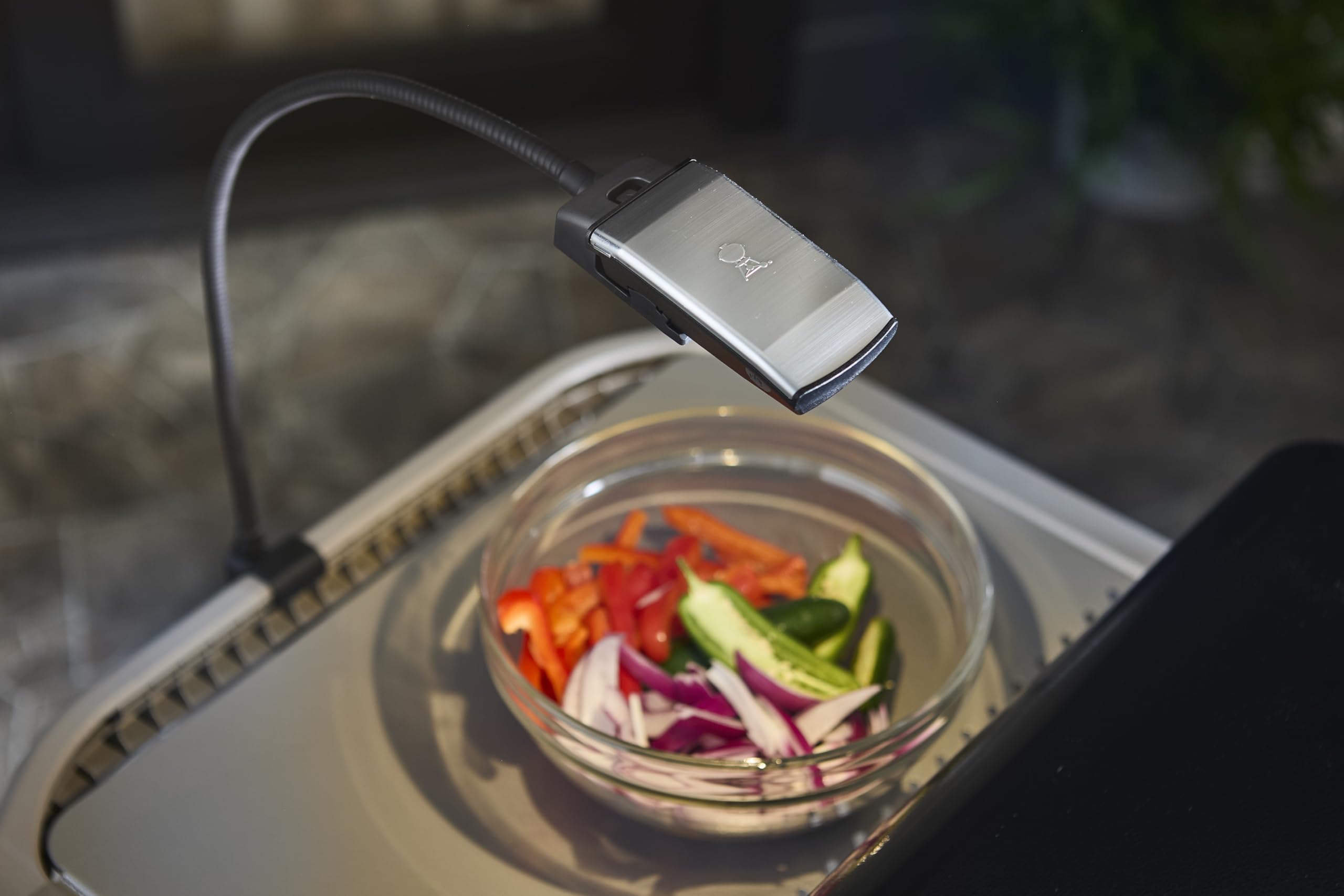 Weber Flex Light lighting grill at night for clearer, safer cooking
