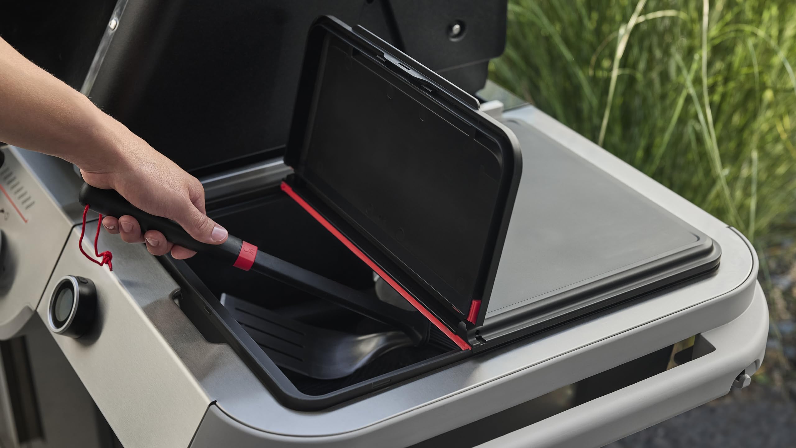 Weber Works bin in outdoor grill setup showing neat storage and faster meal prep