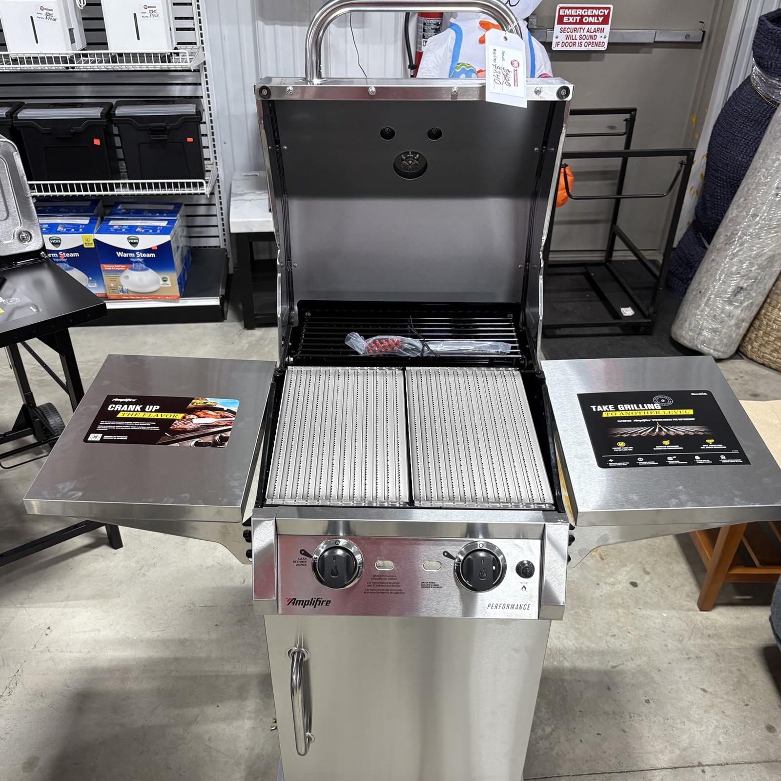 WEBROIL plates inside a working grill delivering even heat and juicier results