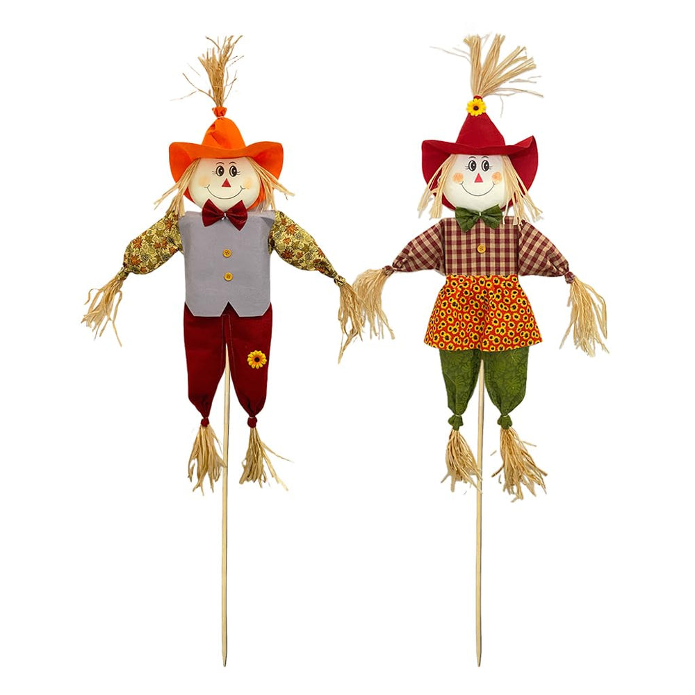 Wedfull front porch display showing two scarecrows adding festive curb appeal