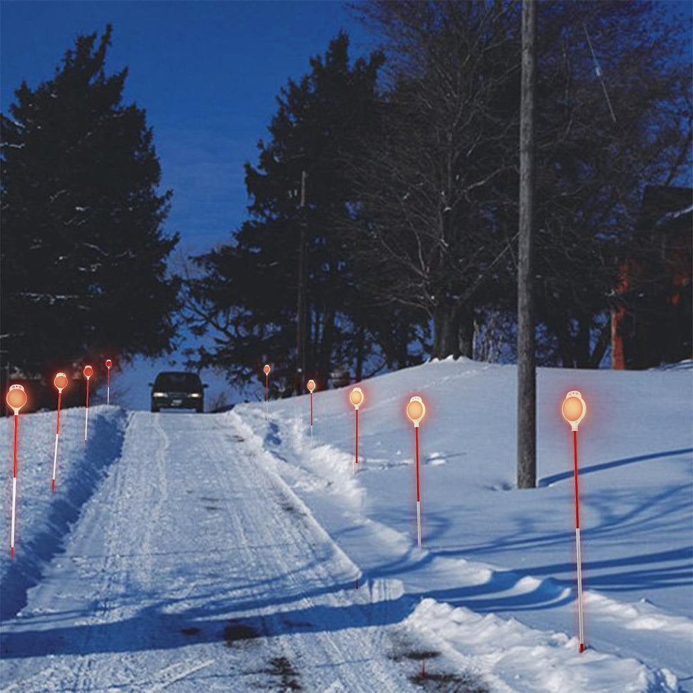 Wefaith markers lit by car headlights showing strong night visibility benefit