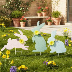 Weibefee rabbit stakes placed in planter adding instant decorative charm