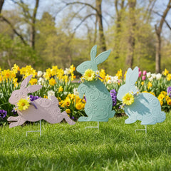 Weibefee trio of stakes lining a flowerbed for festive seasonal display