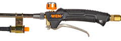 WEN torch in use burning weeds to clear walkways without chemicals