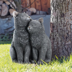 Wenqik cat statue placed in garden adding character and plant complement