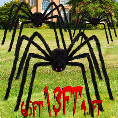 Wettarn giant spider front view shows plush body and red eyes, dramatic porch focal point