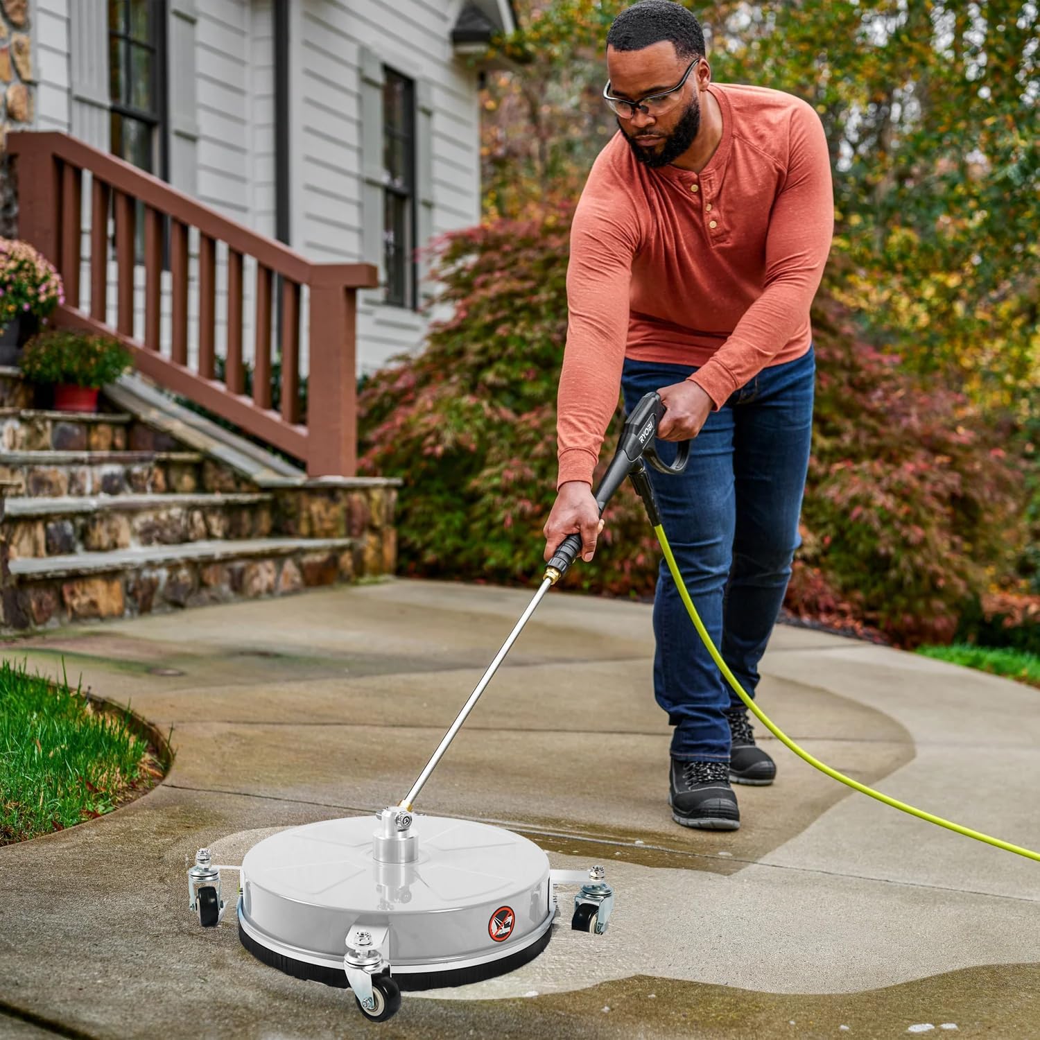 Wexo Palindrog cleaning a driveway illustrating quicker grime removal benefit